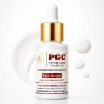 PGC Prism Glow Cosmetics All In One Bright Serum white dropper bottle with cream texture smear and droplets